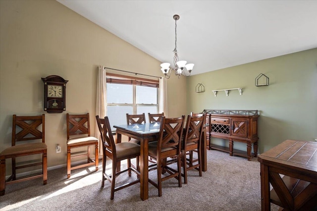 215 Caribou Run, Dundee, MI 48131 - dining area with vaulted ceiling, a chandelier, and carpet