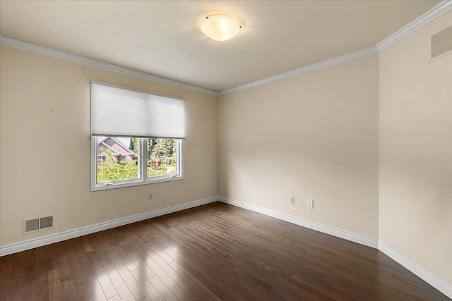 unfurnished room featuring dark wood-style flooring, baseboards, and ornamental molding