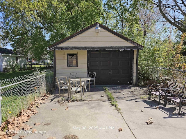 1551 Division St, Saginaw, MI 48602 - detached garage with fence and driveway