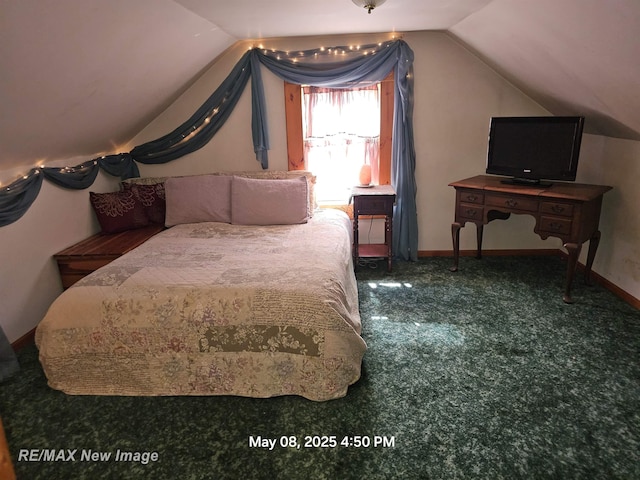 1551 Division St, Saginaw, MI 48602 - bedroom with vaulted ceiling, baseboards, and carpet floors