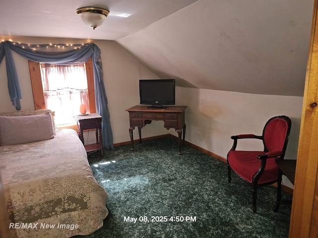 1551 Division St, Saginaw, MI 48602 - carpeted bedroom featuring vaulted ceiling and baseboards