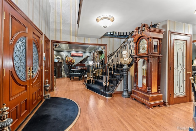 7310 Sandy Creek Ln, Bloomfield Hills, MI 48301 - entrance foyer with wood finished floors and stairs
