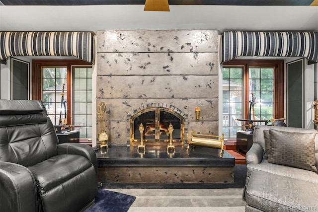 7310 Sandy Creek Ln, Bloomfield Hills, MI 48301 - living room with a large fireplace and healthy amount of natural light