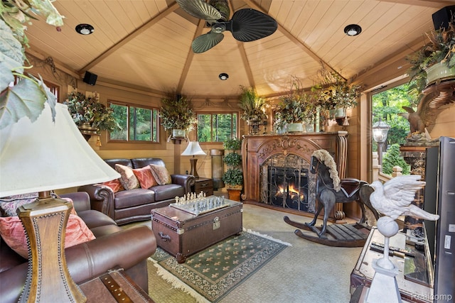 7310 Sandy Creek Ln, Bloomfield Hills, MI 48301 - living area with wooden ceiling, carpet floors, a warm lit fireplace, ceiling fan, and lofted ceiling