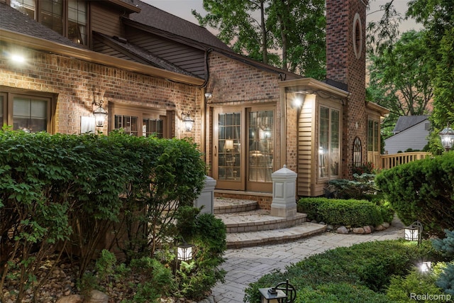 7310 Sandy Creek Ln, Bloomfield Hills, MI 48301 - property entrance featuring brick siding and a chimney