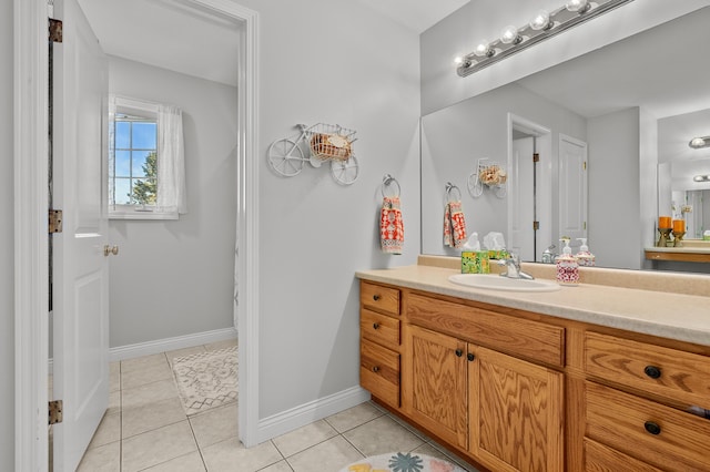 15974 Rustic Ln S, Vicksburg, MI 49097 - bathroom with tile patterned flooring, vanity, and baseboards