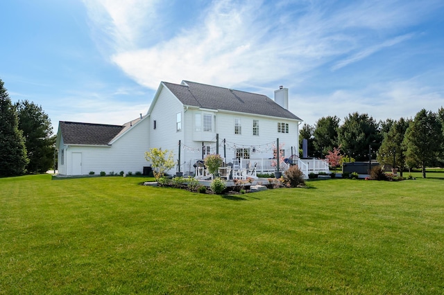 15974 Rustic Ln S, Vicksburg, MI 49097 - back of property featuring a lawn, a chimney, and a shingled roof