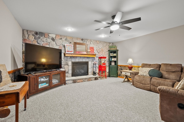 15974 Rustic Ln S, Vicksburg, MI 49097 - carpeted living room with a ceiling fan and a fireplace