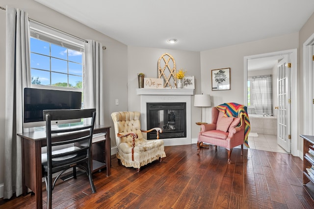 15974 Rustic Ln S, Vicksburg, MI 49097 - living area with healthy amount of natural light, hardwood / wood-style flooring, and a glass covered fireplace