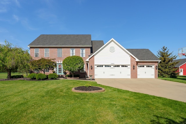 15974 Rustic Ln S, Vicksburg, MI 49097 - colonial-style house featuring concrete driveway, an attached garage, a front lawn, and brick siding
