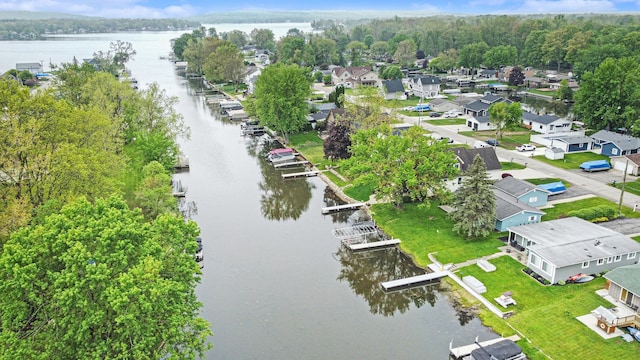 aerial perspective of suburban area with a large body of water