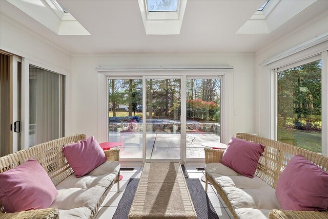 sunroom with a skylight and healthy amount of natural light