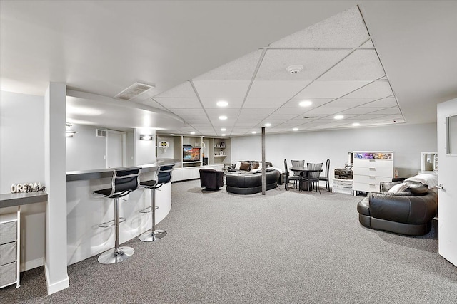 carpeted living area with recessed lighting