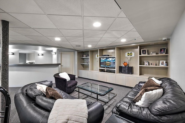 carpeted living room with built in features and recessed lighting