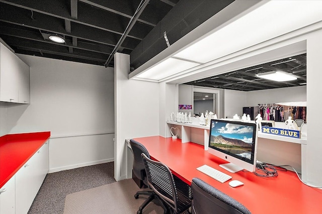 office space featuring carpet flooring and baseboards