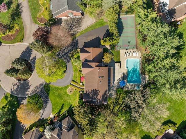 aerial overview of property's location with a pool area