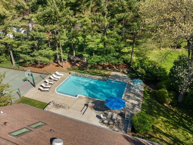 swimming pool with a patio