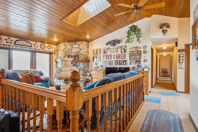 6125 Alber Rd, Saline, MI 48176 - living area featuring wooden ceiling, ceiling fan, light tile patterned flooring, lofted ceiling, and a fireplace