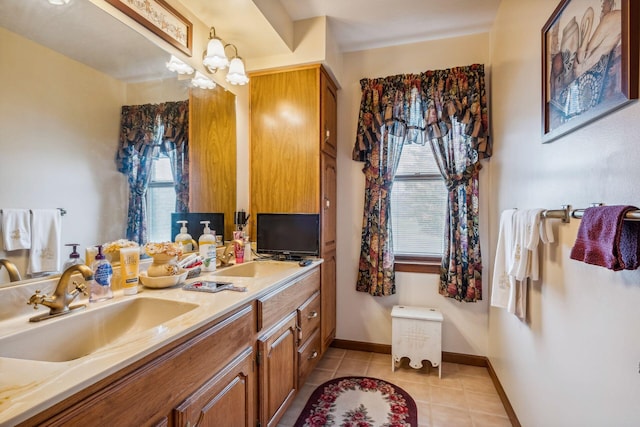 6125 Alber Rd, Saline, MI 48176 - full bathroom featuring healthy amount of natural light, tile patterned flooring, baseboards, and double vanity