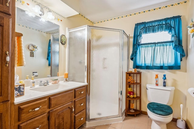 6125 Alber Rd, Saline, MI 48176 - bathroom featuring a stall shower, tile patterned floors, toilet, and vanity