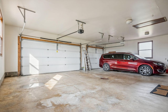 6125 Alber Rd, Saline, MI 48176 - garage featuring a garage door opener