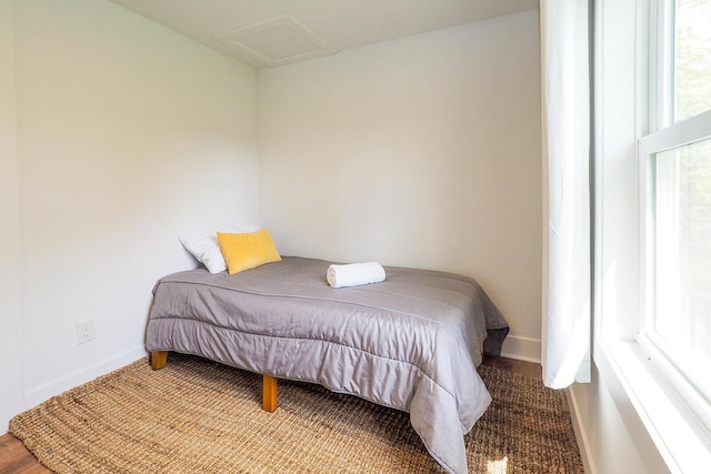 10671 California Rd, Bridgman, MI 49106 - bedroom featuring attic access and baseboards
