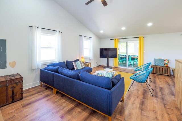 10671 California Rd, Bridgman, MI 49106 - living room featuring wood finished floors, vaulted ceiling, a ceiling fan, recessed lighting, and baseboards