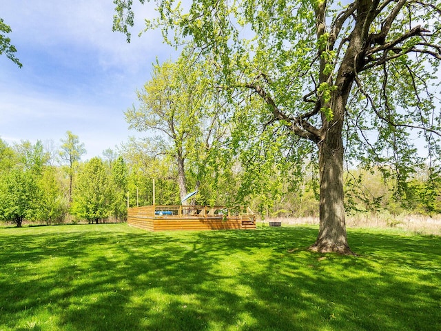 10671 California Rd, Bridgman, MI 49106 - view of grassy yard featuring a deck
