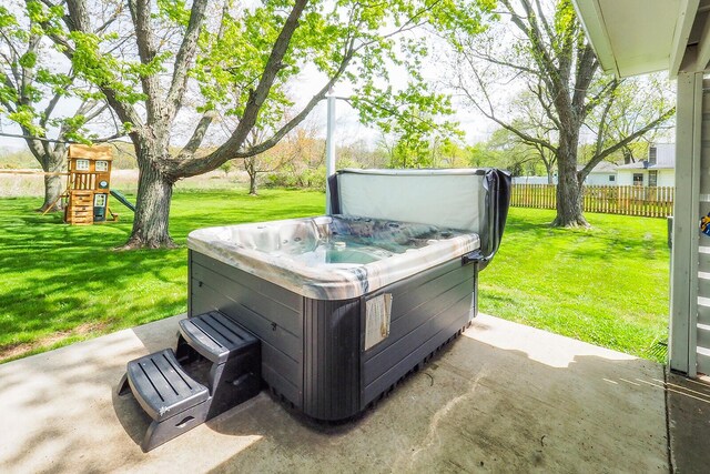 10671 California Rd, Bridgman, MI 49106 - view of patio with a hot tub and a playground
