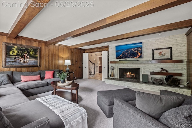 4906 Charing Cross Rd, Bloomfield Hills, MI 48304 - carpeted living area with wooden walls, beam ceiling, a fireplace, and stairway