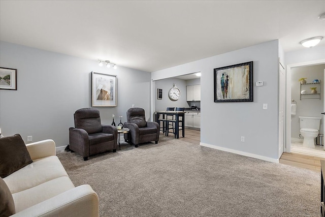 16046 Holz Dr Unit 48, Southgate, MI 48195 - living room with light carpet and baseboards