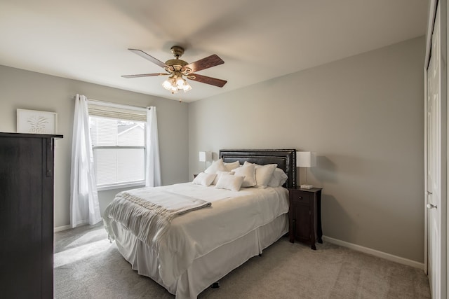 4482 Red Oak Blvd, Waterford, MI 48329 - bedroom featuring light carpet, baseboards, and ceiling fan