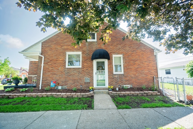 13185 Sycamore St, Southgate, MI 48195 - view of front of house with brick siding and a gate