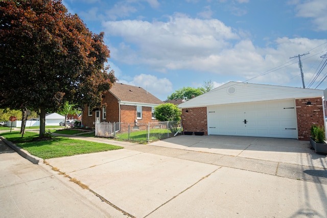 13185 Sycamore St, Southgate, MI 48195 - view of front of home with brick siding and a detached garage