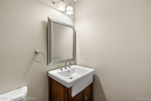 1461 Woodglen Ln Unit G-28, Bloomfield Hills, MI 48304 - bathroom with vanity and toilet