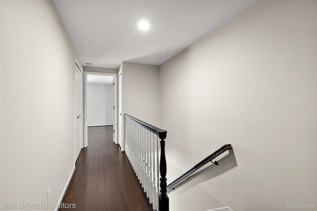 1461 Woodglen Ln Unit G-28, Bloomfield Hills, MI 48304 - hallway with an upstairs landing, dark wood-style flooring, and recessed lighting