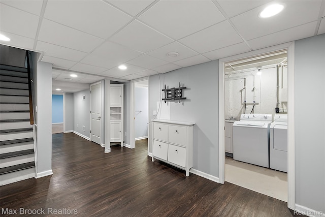 1461 Woodglen Ln Unit G-28, Bloomfield Hills, MI 48304 - finished below grade area with washing machine and clothes dryer, dark wood-type flooring, stairway, a drop ceiling, and recessed lighting