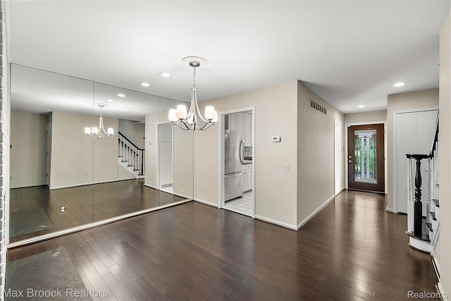 1461 Woodglen Ln Unit G-28, Bloomfield Hills, MI 48304 - unfurnished dining area with a chandelier, stairway, wood-type flooring, and recessed lighting