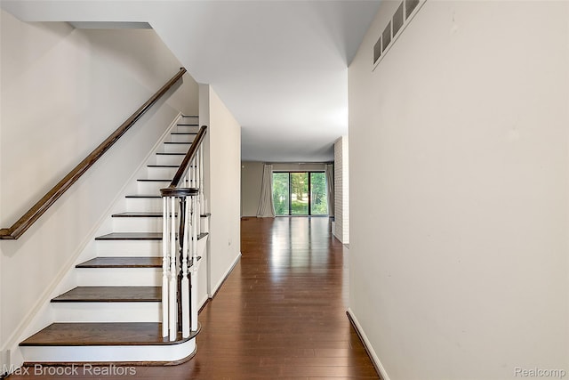 1461 Woodglen Ln Unit G-28, Bloomfield Hills, MI 48304 - stairway featuring wood-type flooring and baseboards