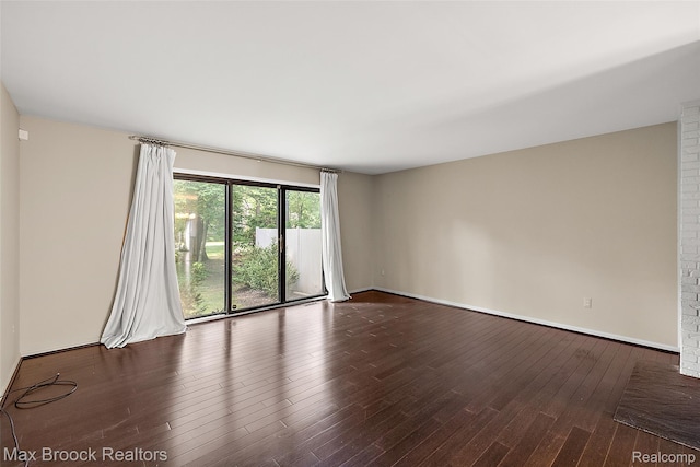 1461 Woodglen Ln Unit G-28, Bloomfield Hills, MI 48304 - unfurnished room with wood finished floors and baseboards