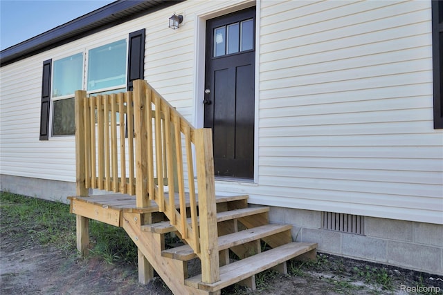 7376 Capac Rd, Yale, MI 48097 - doorway to property featuring crawl space