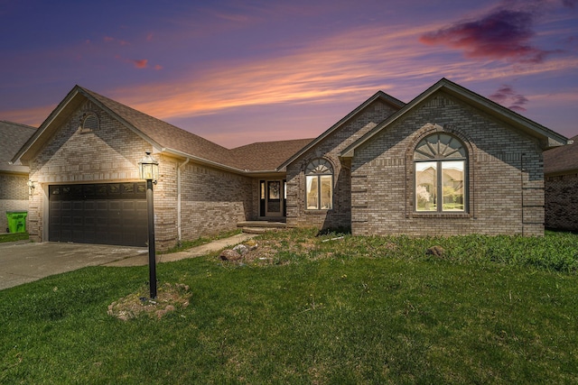 53242 Clarion Dr, Macomb, MI 48042 - view of front of house featuring brick siding, an attached garage, driveway, a front yard, and roof with shingles