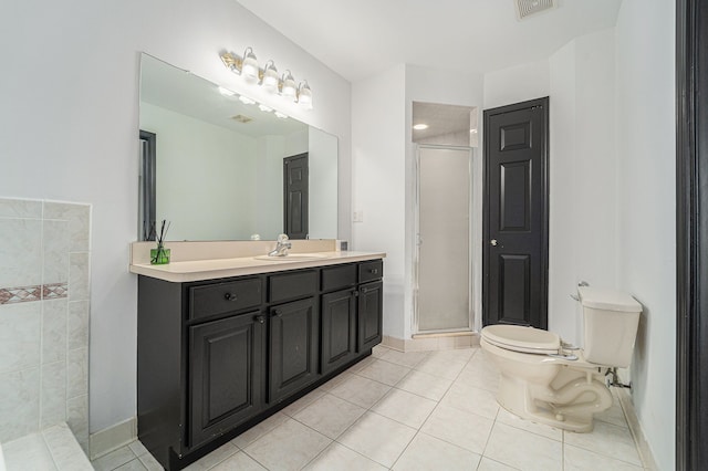 53242 Clarion Dr, Macomb, MI 48042 - bathroom with toilet, tile patterned floors, a shower stall, vanity, and baseboards