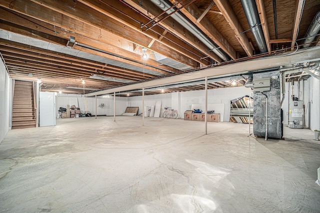 53242 Clarion Dr, Macomb, MI 48042 - unfinished below grade area with stairway, water heater, and heating unit