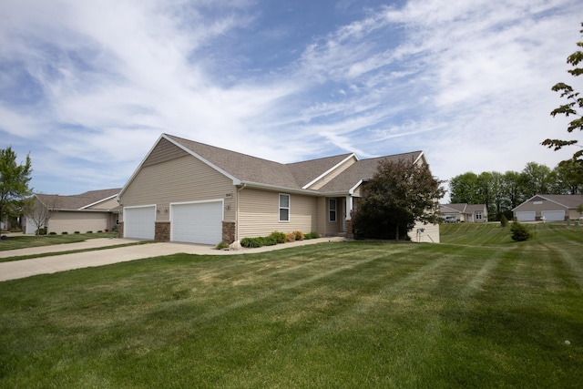 view of front of house featuring concrete driveway, a garage, a front lawn, and a shingled roof