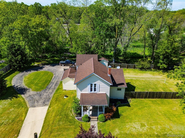 638 E Michigan Ave, Grass Lake, MI 49240 - aerial view of property and surrounding area featuring a forest