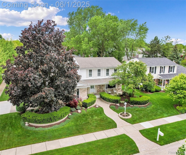 42736 Boulden Ct, Canton, MI 48187 - view of front of property featuring a front lawn, a shingled roof, and brick siding