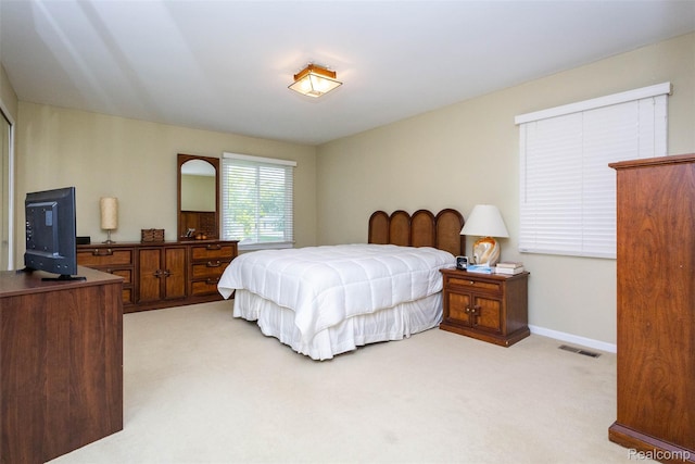 5423 Hauser Way W, Bloomfield, MI 48323 - bedroom with light carpet and baseboards