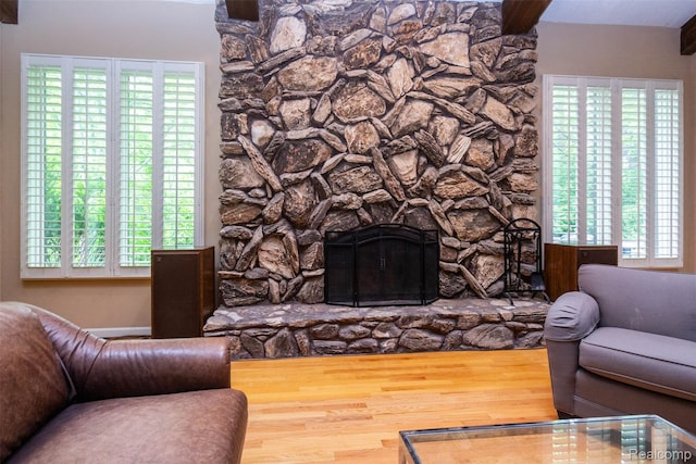 5423 Hauser Way W, Bloomfield, MI 48323 - living room featuring wood finished floors, plenty of natural light, and a stone fireplace