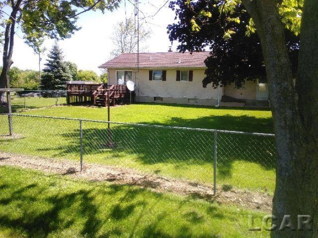 11800 N Adrian Hwy, Clinton, MI 49236 - back of house with a wooden deck